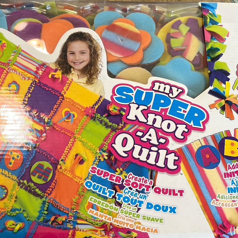 My Super Knot-A-Quilt kit. No stitching, just knotting. Comes w/box. Alex brand.